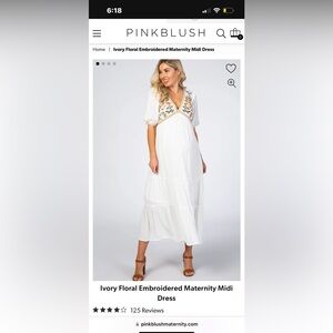 White embroidered floral maternity dress.
